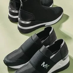 Michael Kors Women's Skyler Wedge Bootie Sock Sneakers 7 Michael Kors Women's Skyler Wedge Bootie Sock Sneakers -Michaelkors shop 18612356 fpx